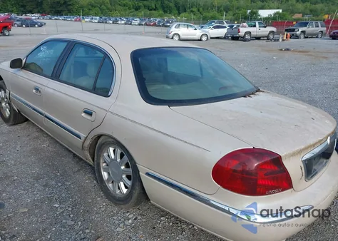 2001 Lincoln Continental z USA, uszkodzony, nr VIN 1LNHM97V91Y667242